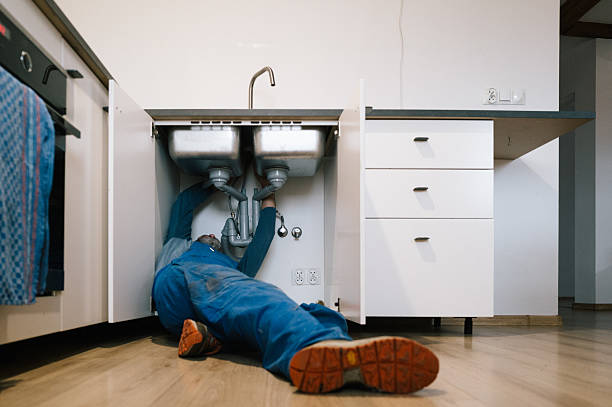 Professional Drain Cleaning technician working in Fort Bridger, WY